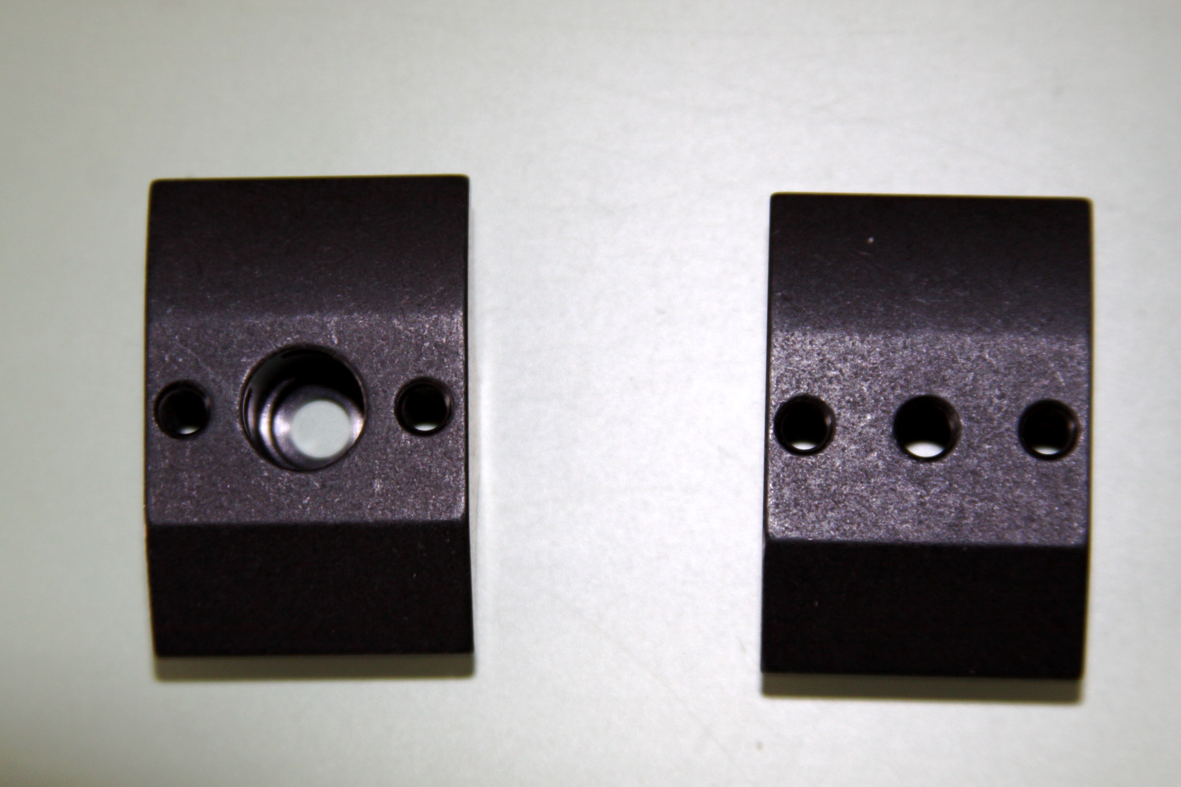 Two halves flat next to each other; Left half shows QD Mount.