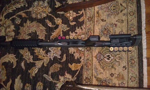Parkerized Remington 870 Tactical, Knoxx SpecOps Recoil Reducing Stock, Blackhawk Stock Shell Holder, CAA Forend Parkerized Remington 870 Tactical, Knoxx SpecOps Recoil Reducing Stock, Blackhawk Stock Shell Holder, CAA Forend