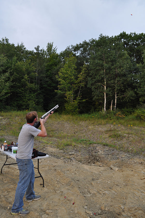 Remington 870 Marine Magnum - Magpul Stock & Forearm@ Clay pigeon in view