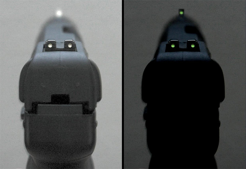 The tritium-illuminated fixed sights of the Five-seveN USG pistol, in normal lighting and dim lighting.