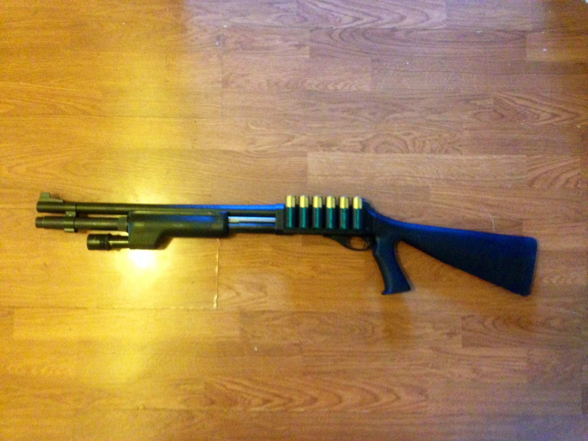 Remington 870 Police<br />Remington factory +2 mag extension with factory magazine clamp<br />Speedfeed stock<br />Tac Star side saddle<br />Wilson Combat Ghost ring tritium sights<br />Surefire forend