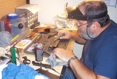 The firearm being worked on is a J. Stevens Arms &amp; Tool Co. Model 200 20ga. Pump Action (takedown style) shotgun. @ 1912 ish by 4xxx serial number.