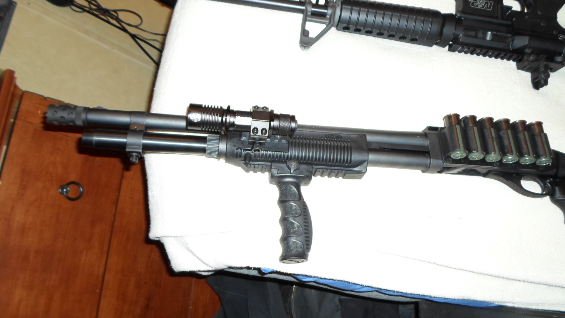 On my 870 with my Acid tactical flashlight &amp; the CAA grip. Willing to add the CAA grip for a extra 15.00 dollars and will cover shipping.