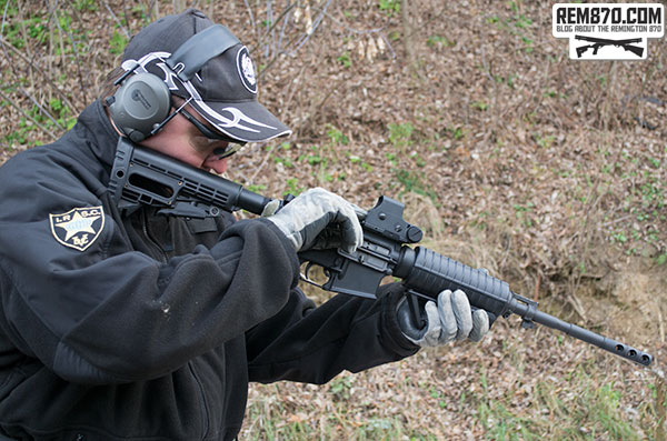 Shooter with AR-15 Rifle with Eotech