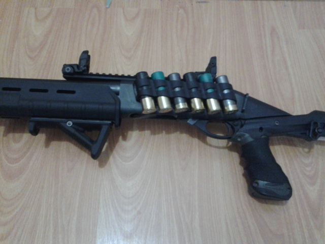 Remington 870 with GG&G Sidesaddle, AFG grip, Rail, Magpul MBUS Backup Sights Remington 870 with GG&G Sidesaddle, AFG grip, Rail, Magpul MBUS Backup Sights