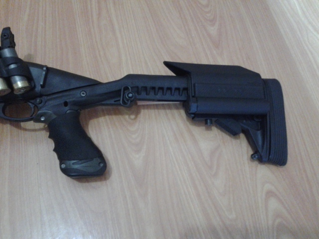 Remington 870 with Knoxx Stock, Powerpak, Blackhawk Powerpak Modular Cheek Piece Kit, Hogue Slip-on Grip Remington 870 with Knoxx Stock, Powerpak, Blackhawk Powerpak Modular Cheek Piece Kit, Hogue Slip-on Grip