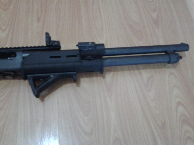 Remington 870 with Streamlight TLR-4 Tactical Light & Laser Sight, Magpul forend, Magpul AFG2 angled foregrip Remington 870 with Streamlight TLR-4 Tactical Light & Laser Sight, Magpul forend, Magpul AFG2 angled foregrip